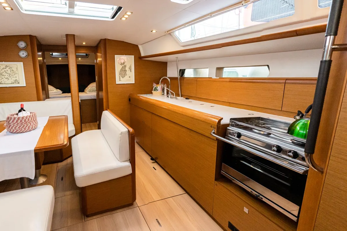 Galley of FILIPPOS I Boat location in LEFKAS MARINA, D-marin 1 SUP FREE, a Jeanneau Sun Odyssey 479 sailboat at Municipal…