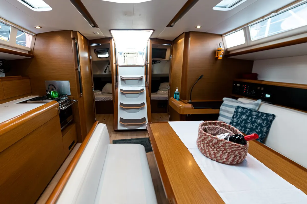 Salon of FILIPPOS I Boat location in LEFKAS MARINA, D-marin 1 SUP FREE, a Jeanneau Sun Odyssey 479 sailboat at Municipal U…
