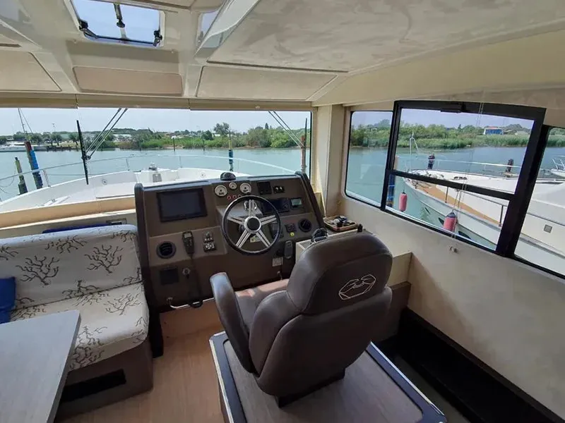 Cockpit of Sea Star V, a Cranchi Eco Trawler 53 LD motorboat at Cannigione, Italy