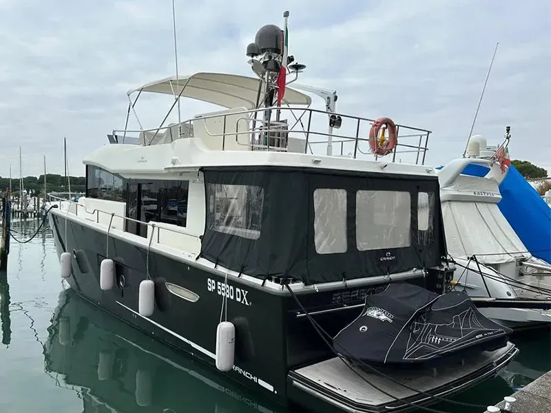 Exterior view of Sea Star V, a Cranchi Eco Trawler 53 LD motorboat at Cannigione, Italy
