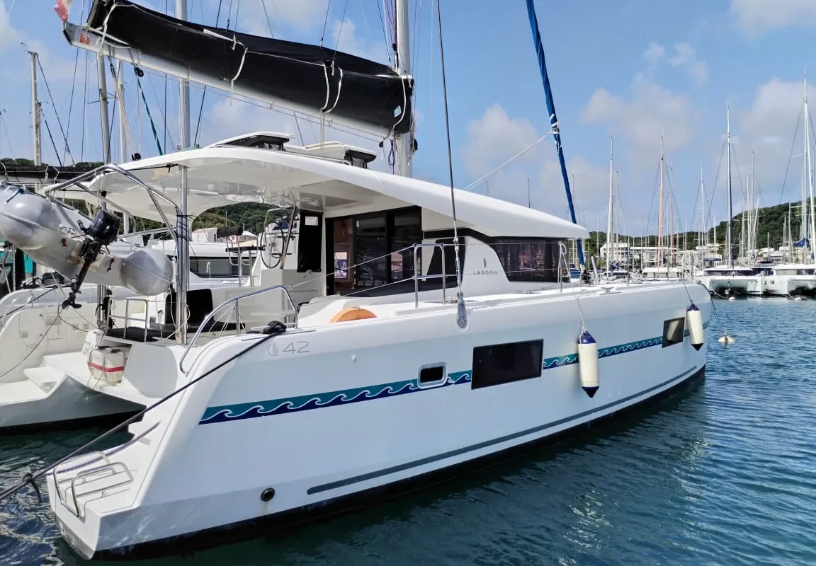 Exterior view of Tigra, a Lagoon 42 catamaran at Pointe-à-Pitre, France