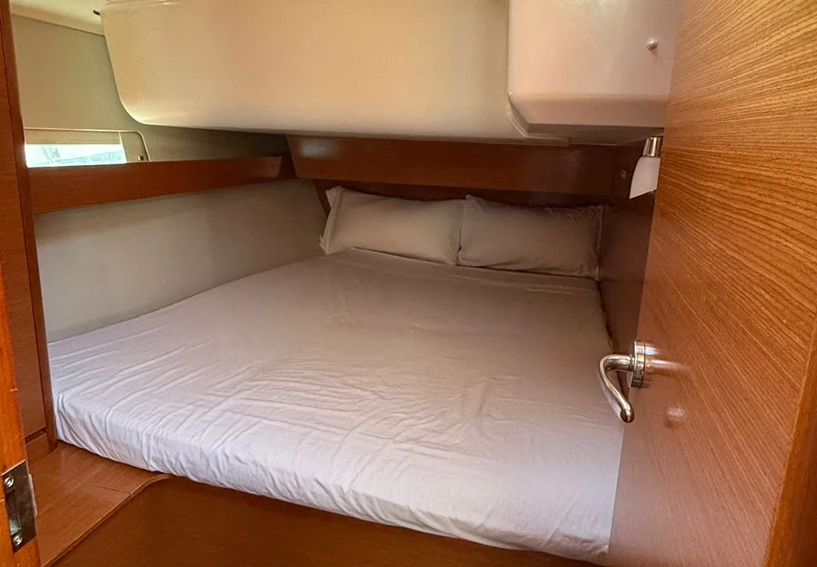 Cabin on Rita, a Dufour 460 Grand Large sailboat at es Jonquet, Spain