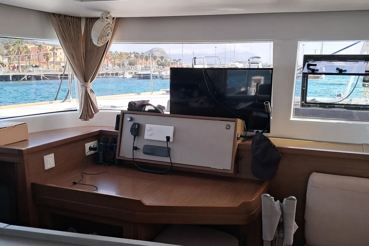 Salon of Harael, a Lagoon 450 Fly catamaran at Figari, Italy