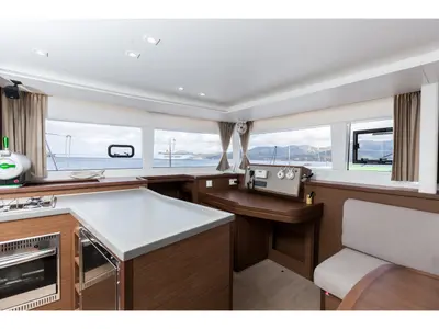 Salon of Harael, a Lagoon 450 Fly catamaran at Figari, Italy