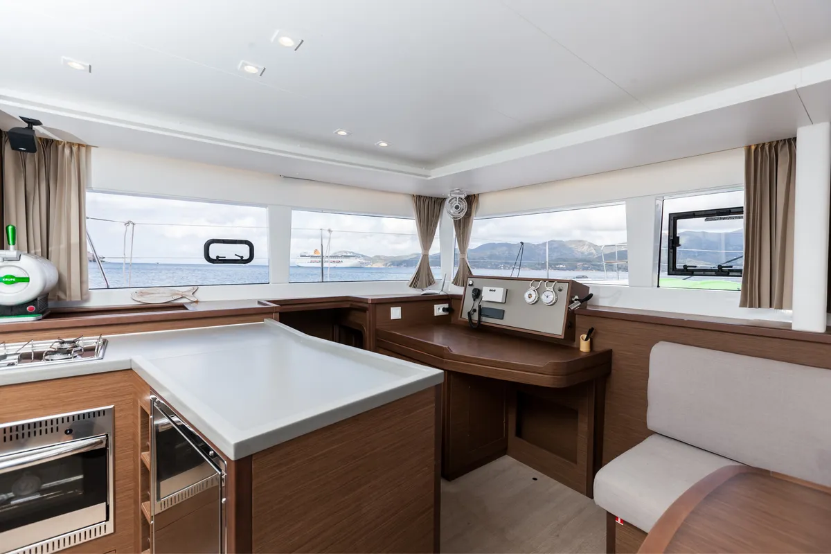 Salon of Harael, a Lagoon 450 Fly catamaran at Figari, Italy