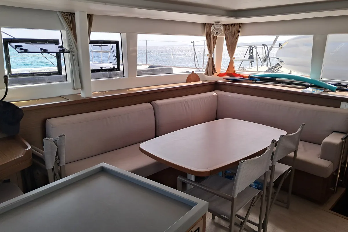 Salon of Harael, a Lagoon 450 Fly catamaran at Figari, Italy