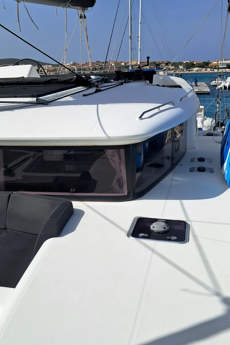 Exterior view of Harael, a Lagoon 450 Fly catamaran at Figari, Italy