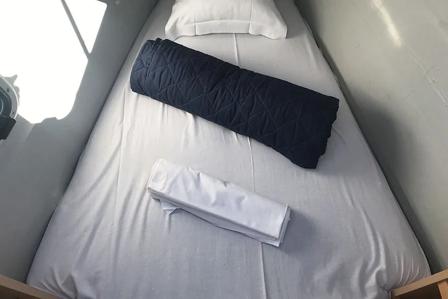 Cabin on Corona Borealis, a Lagoon 450 Fly catamaran at Nettuno, Italy