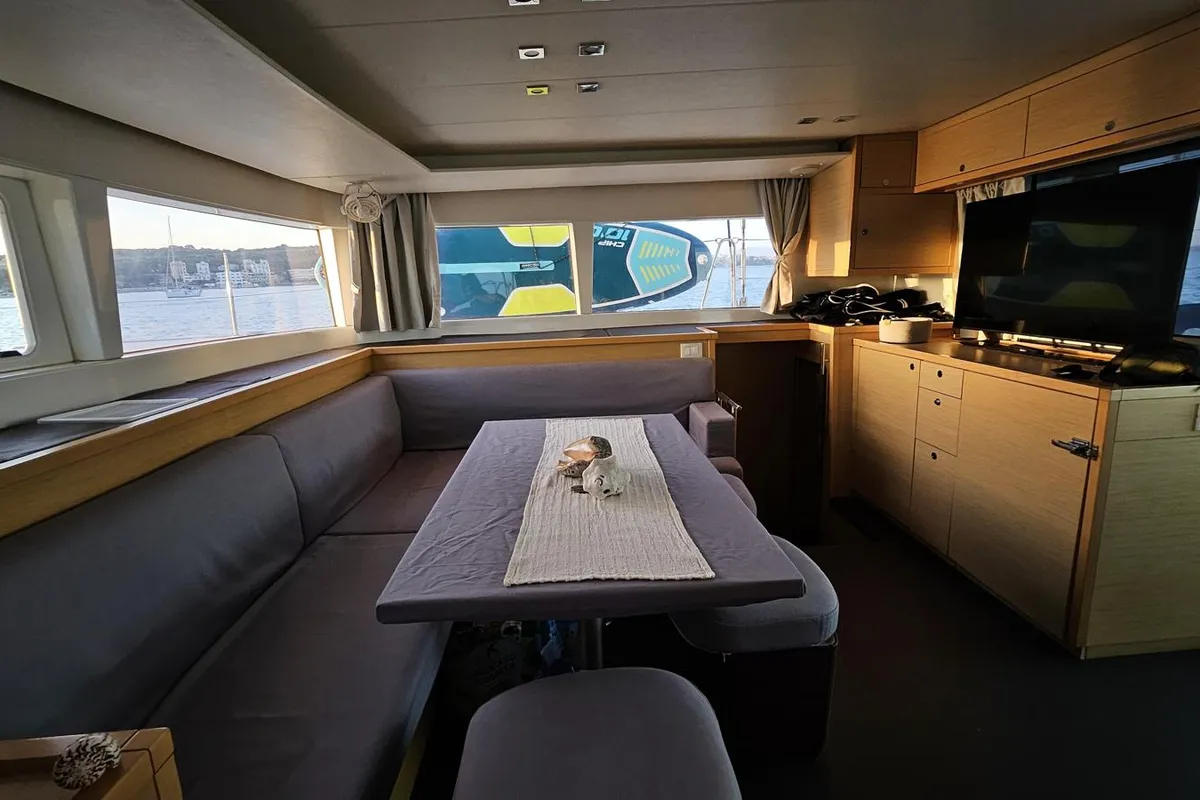 Salon of Corona Borealis, a Lagoon 450 Fly catamaran at Nettuno, Italy
