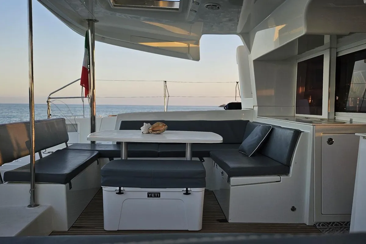 Deck of Corona Borealis, a Lagoon 450 Fly catamaran at Nettuno, Italy
