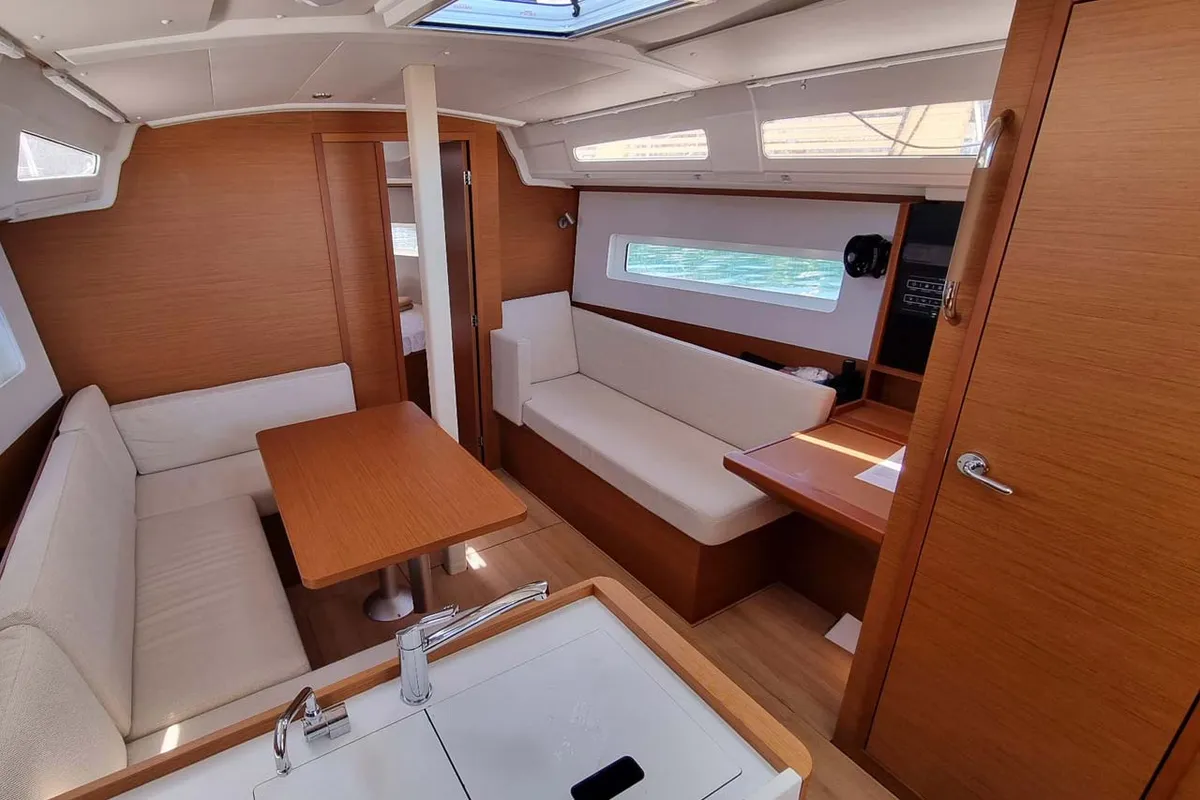 Salon of Bella Mia, a Jeanneau Sun Odyssey 380 sailboat at Figari/Golfo Aranci, Italy