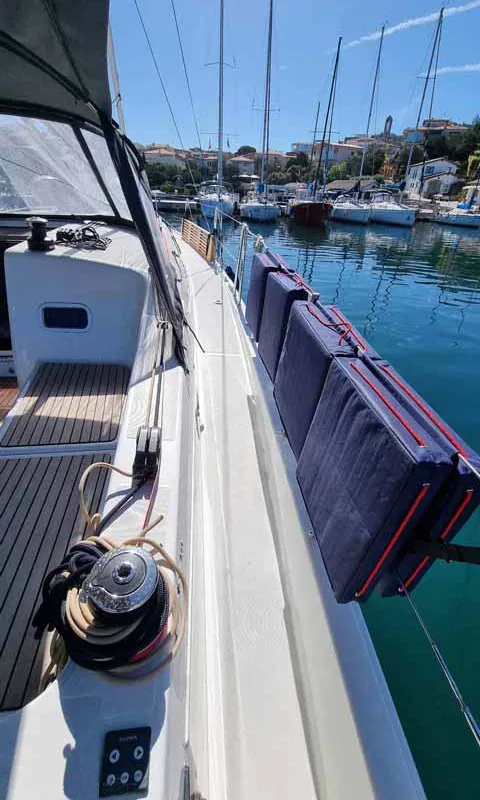 Deck of Bella Mia, a Jeanneau Sun Odyssey 380 sailboat at Figari/Golfo Aranci, Italy