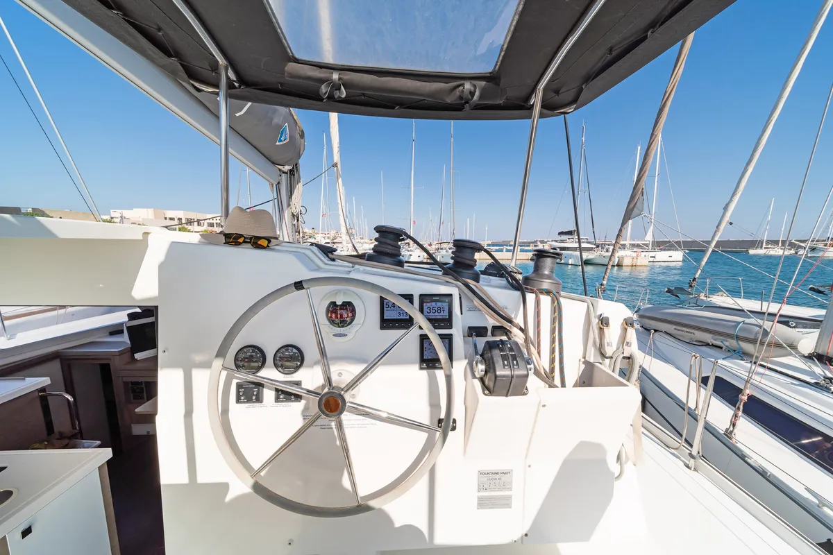 Cockpit of Fortuna, a Fountaine Pajot Lucia 40 catamaran at Municipal Unit of Rhodes, Greece