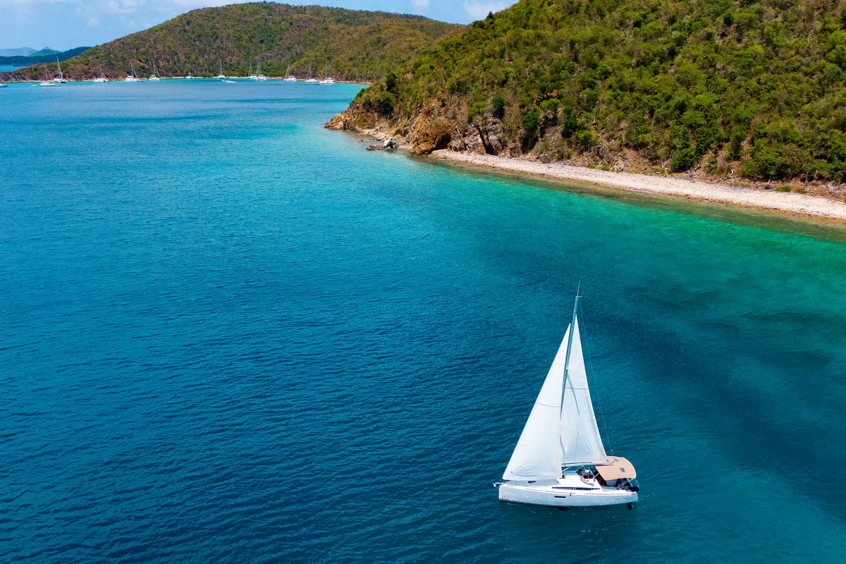 Exterior view of Off The Clock, a Jeanneau Sun Odyssey 349 sailboat at Road Town, British Virgin Islands