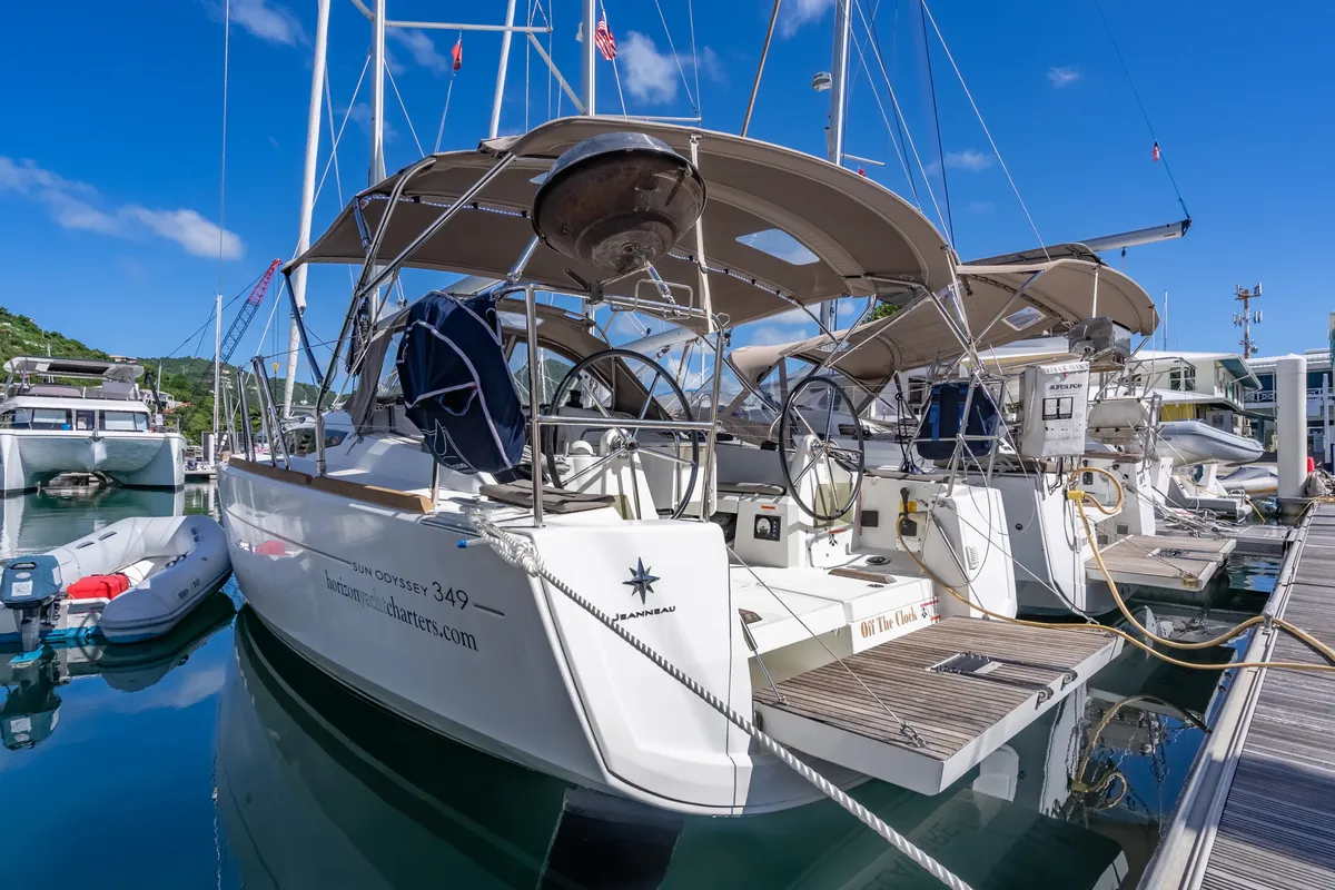 Exterior view of Off The Clock, a Jeanneau Sun Odyssey 349 sailboat at Road Town, British Virgin Islands