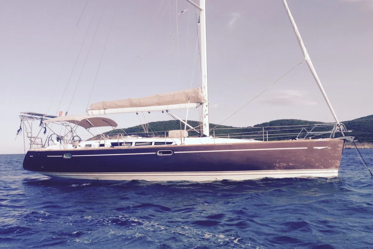 Exterior view of Rubra, a Jeanneau Sun Odyssey 49 sailboat at Toulon, France
