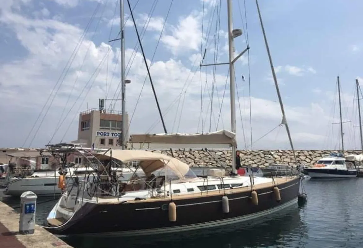 Exterior view of Rubra, a Jeanneau Sun Odyssey 49 sailboat at Toulon, France