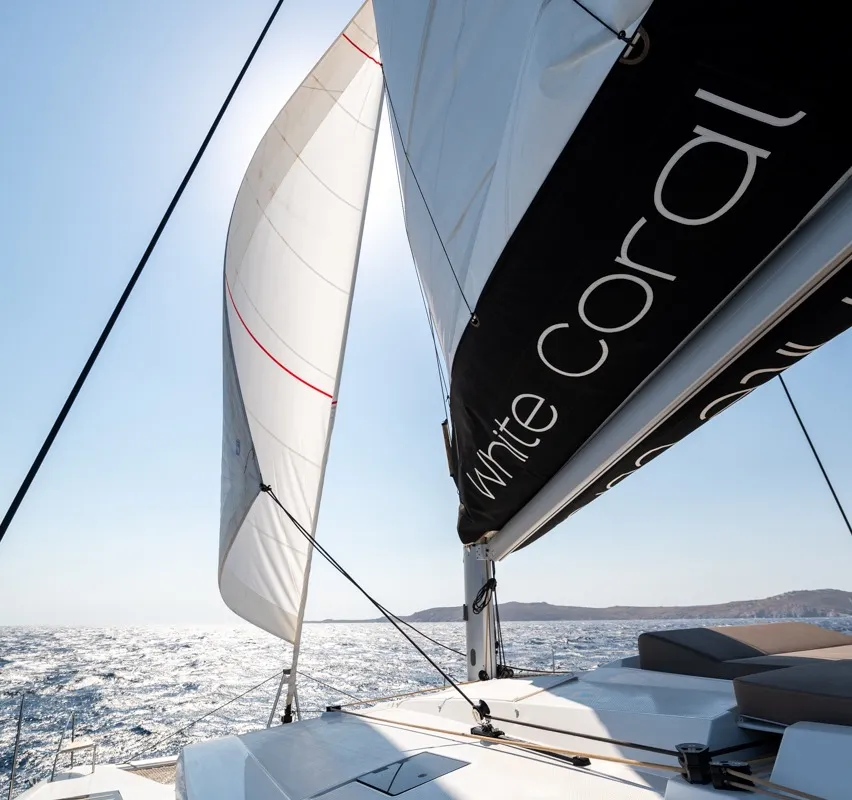 White Coral, a Fountaine Pajot 47 catamaran at Platys Gialos, Greece