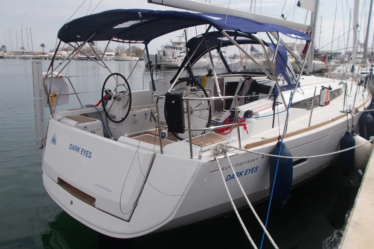 Exterior view of Dark Eyes, a Jeanneau Sun Odyssey 419 sailboat at Figari/Golfo Aranci, Italy