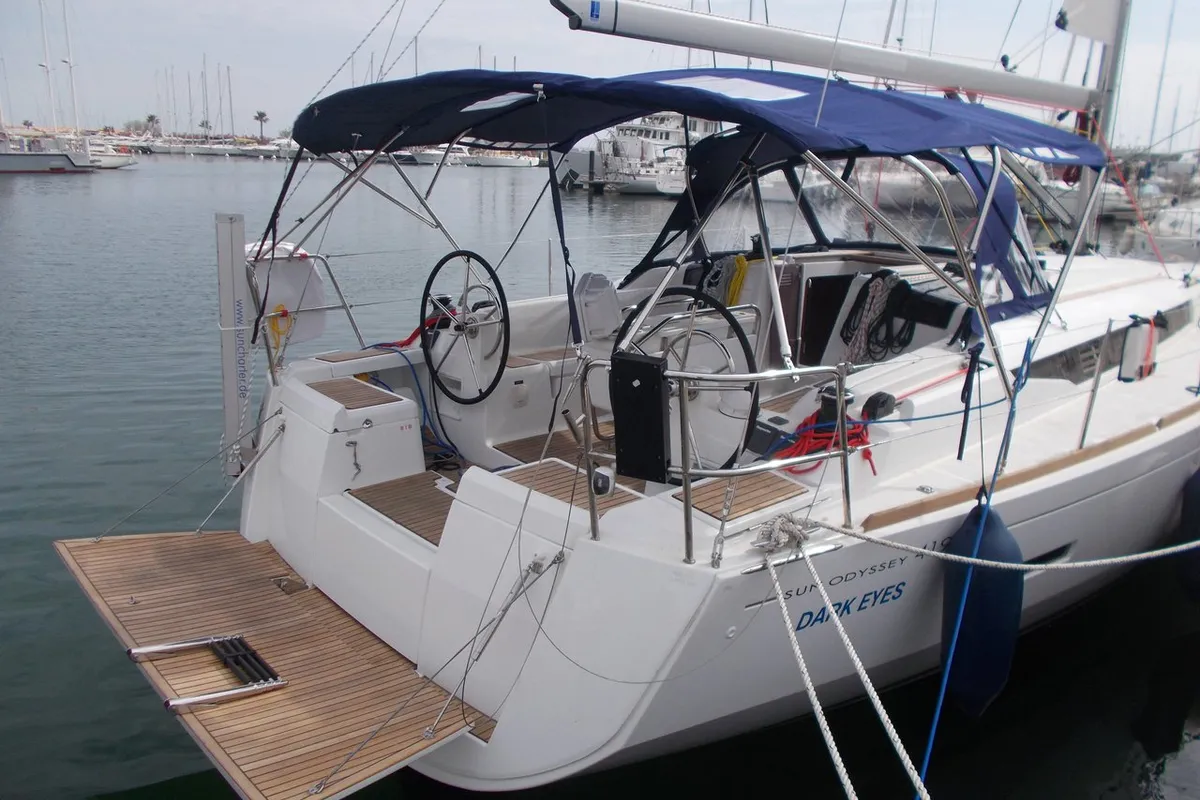 Exterior view of Dark Eyes, a Jeanneau Sun Odyssey 419 sailboat at Figari/Golfo Aranci, Italy