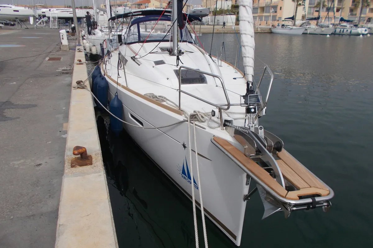 Exterior view of Dark Eyes, a Jeanneau Sun Odyssey 419 sailboat at Figari/Golfo Aranci, Italy