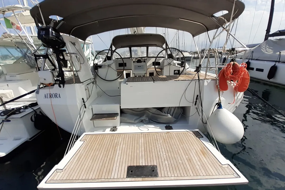 Exterior view of Aurora, a Bavaria C45 sailboat at Punta Ala, Italy