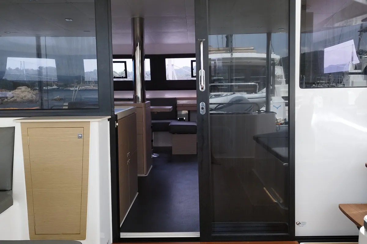 Salon of Delphinus, a Dufour 48 Catamaran catamaran at Olbia, Italy