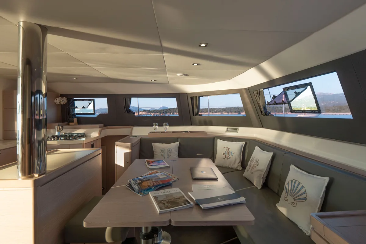 Salon of Delphinus, a Dufour 48 Catamaran catamaran at Olbia, Italy