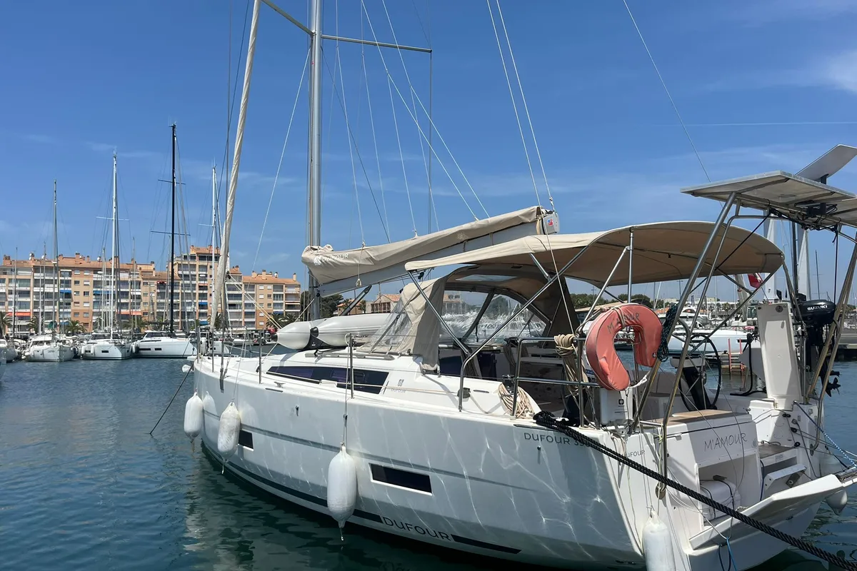 Exterior view of M'Amour, a Dufour 390 sailboat at Hyères, France
