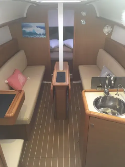 Salon of Carry On, a Jeanneau Sun Odyssey 33i sailboat at Kontokali, Greece