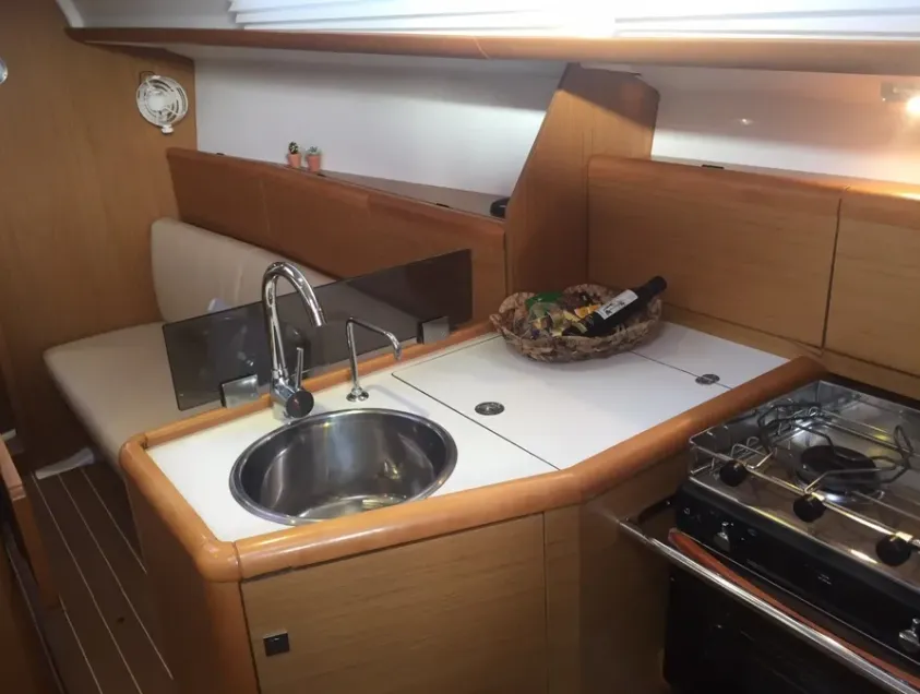 Galley of Carry On, a Jeanneau Sun Odyssey 33i sailboat at Kontokali, Greece