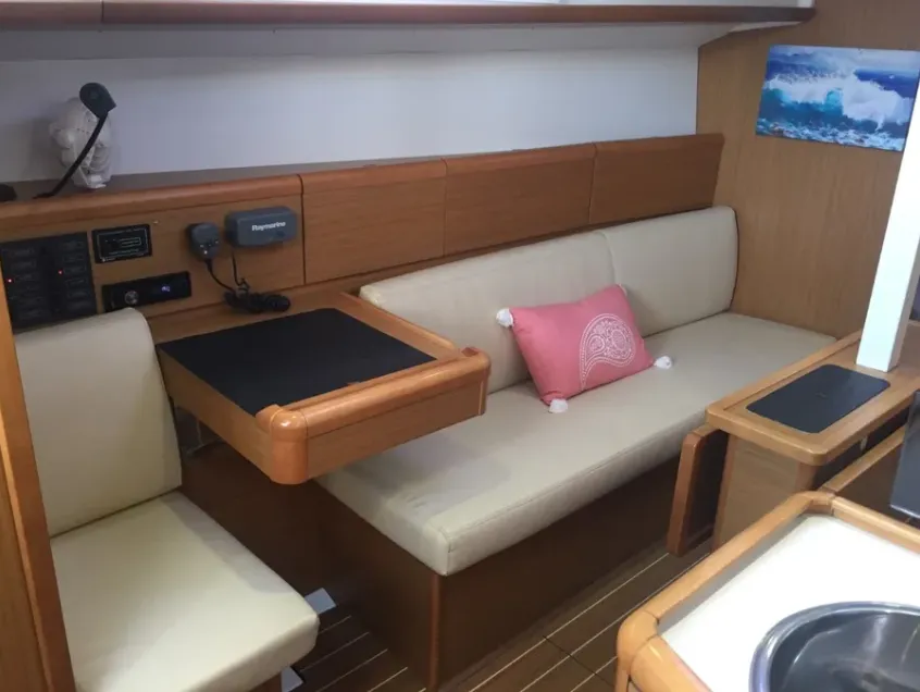 Salon of Carry On, a Jeanneau Sun Odyssey 33i sailboat at Kontokali, Greece