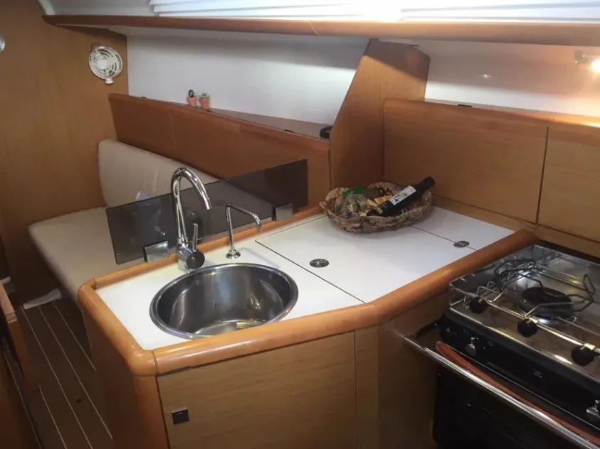 Galley of Carry On, a Jeanneau Sun Odyssey 33i sailboat at Kontokali, Greece