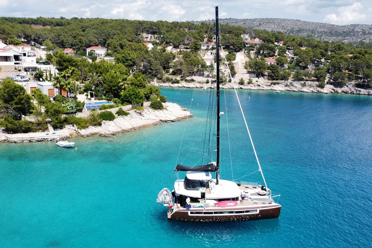 Exterior view of Princess Kiss, a Lagoon 50 catamaran at Grad Kaštela, Croatia