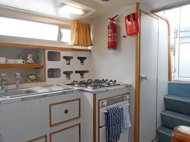 Galley of Kingfisher WHS - Budget 1, a Cygnet Kingfisher WHS motorboat at Laggan, United Kingdom