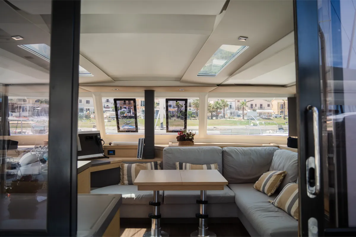Salon of Premium, a Fountaine Pajot Saona 47 catamaran at Castellammare del Golfo, Italy