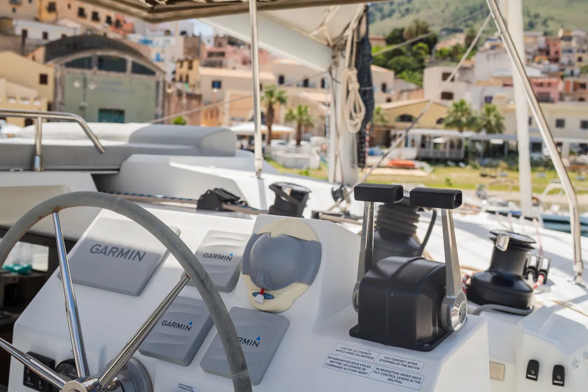 Cockpit of Premium, a Fountaine Pajot Saona 47 catamaran at Castellammare del Golfo, Italy