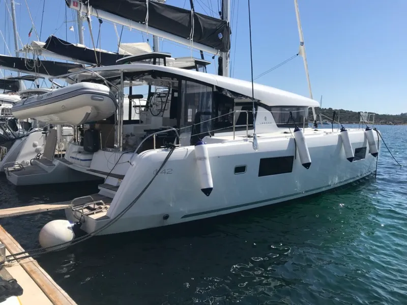 Exterior view of Zippiri, a Lagoon 42 catamaran at Olbia, Italy