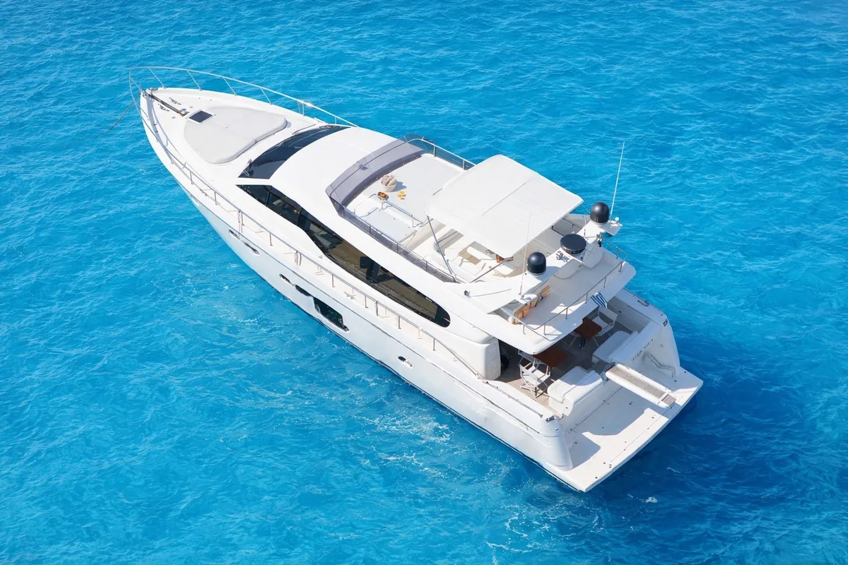 Exterior view of ESCAPE, a Ferretti 630 motor yacht at Ornos, Greece