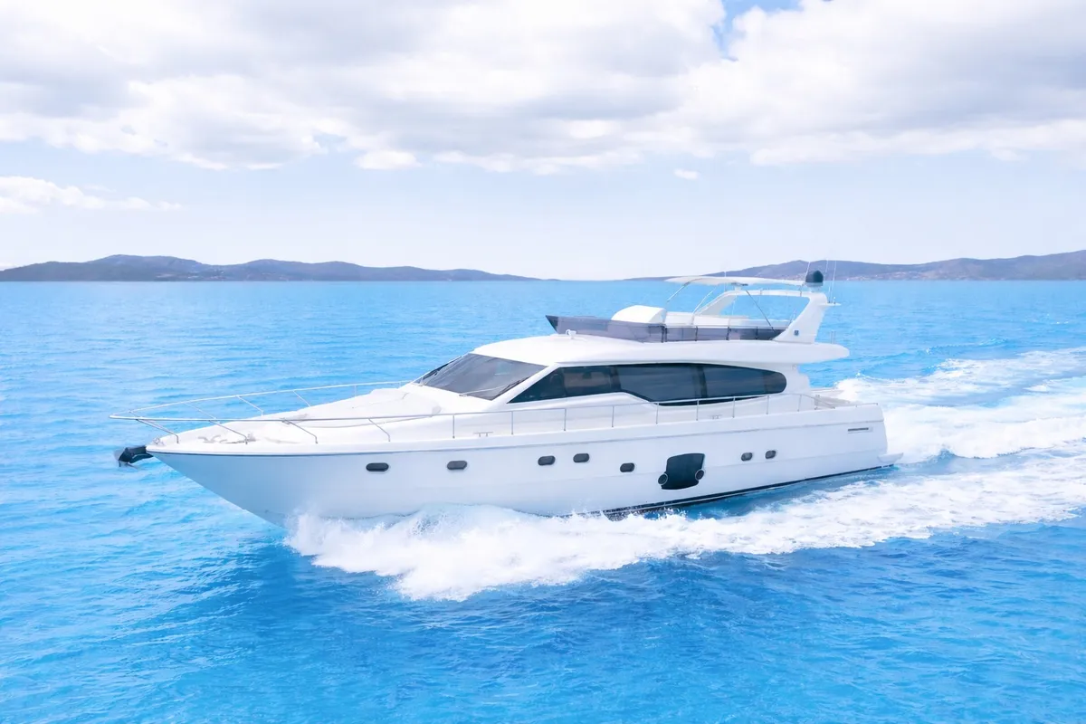 Exterior view of ESCAPE, a Ferretti 630 motor yacht at Ornos, Greece