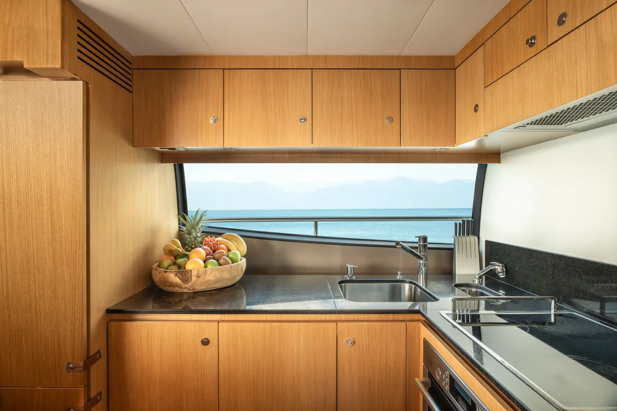 Galley of ESCAPE, a Ferretti 630 motor yacht at Ornos, Greece