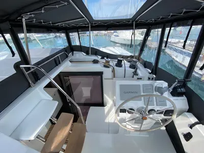 Cockpit of Ooga Chaka, a Fountaine Pajot Astréa 42 catamaran at Sithonia Municipal Unit, Greece