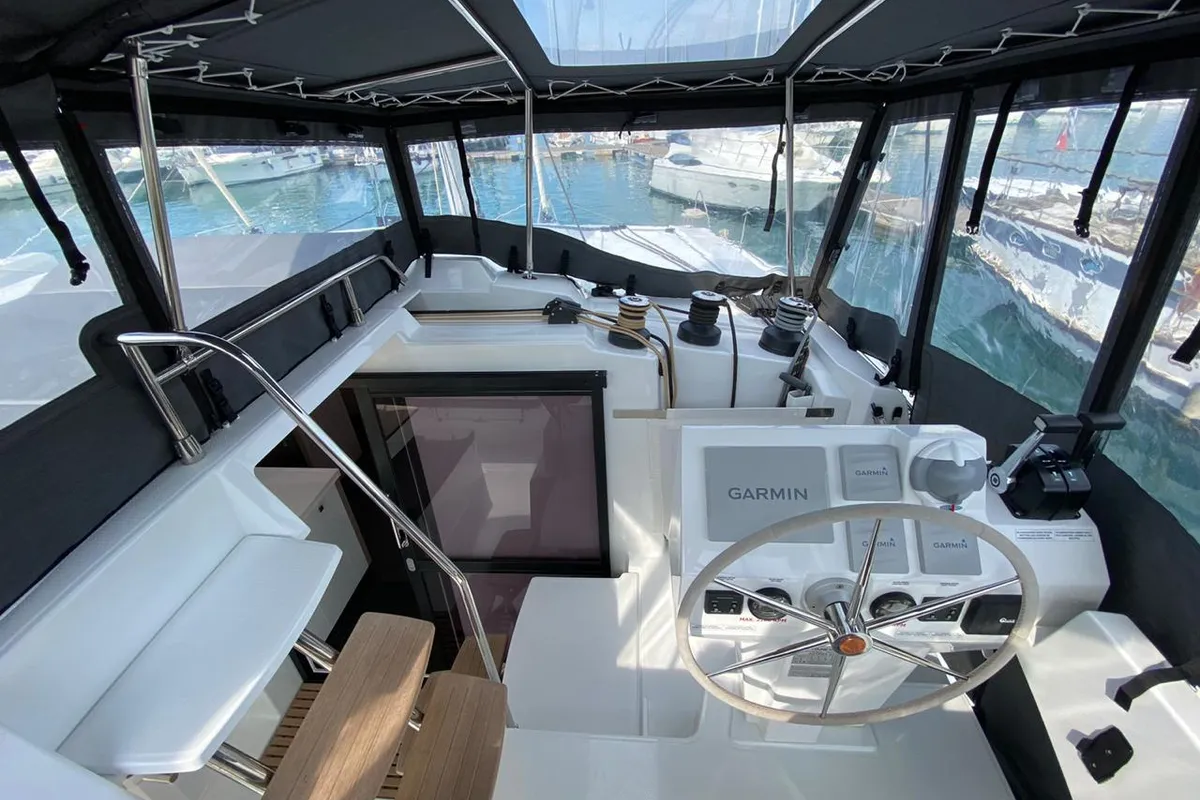 Cockpit of Ooga Chaka, a Fountaine Pajot Astréa 42 catamaran at Sithonia Municipal Unit, Greece