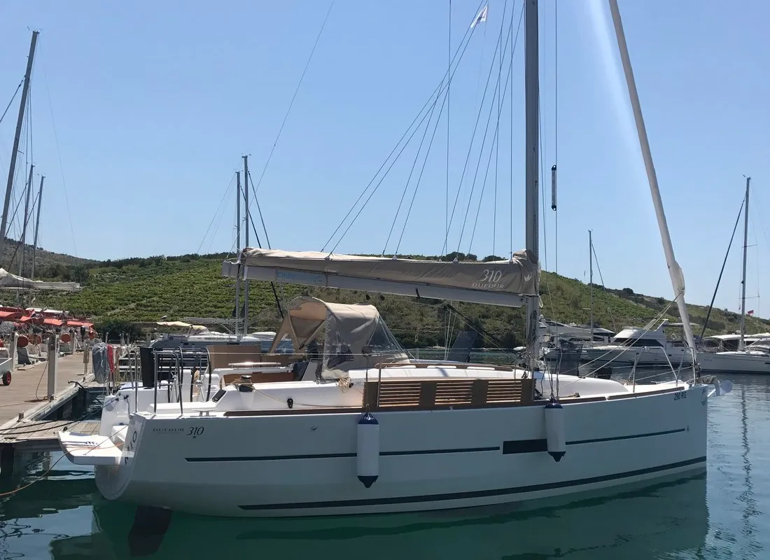 Exterior view of Mio, a Dufour 310 GL sailboat at Primošten, Croatia