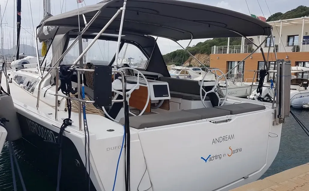 Exterior view of Andream, a Dufour 430 sailboat at Olbia, Italy