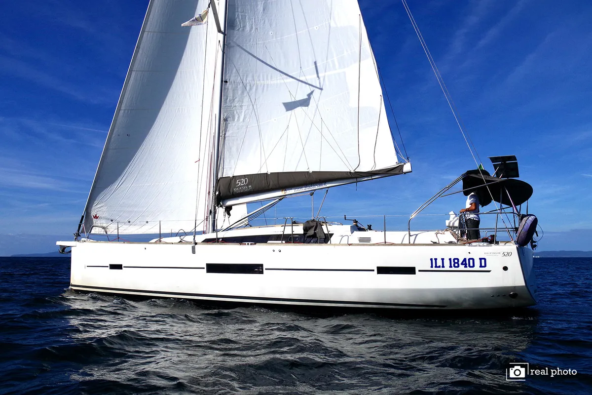Exterior view of Stella, a Dufour 520 GL sailboat at Puntone di Scarlino, Italy