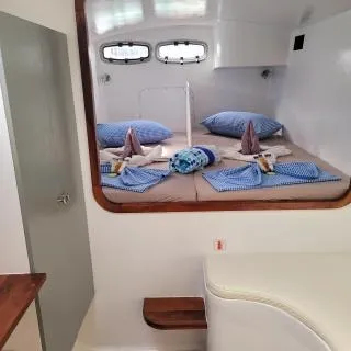 Cabin on Valerie, a Sea-Tribe DH550 catamaran at Roche Caiman, Seychelles