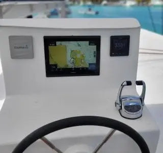 Cockpit of Valerie, a Sea-Tribe DH550 catamaran at Roche Caiman, Seychelles