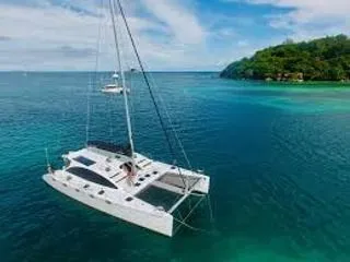 Exterior view of Valerie, a Sea-Tribe DH550 catamaran at Roche Caiman, Seychelles
