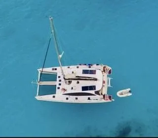 Exterior view of Valerie, a Sea-Tribe DH550 catamaran at Roche Caiman, Seychelles